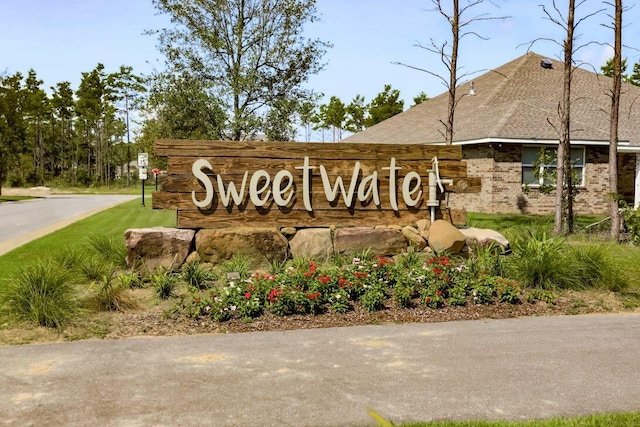 view of community sign