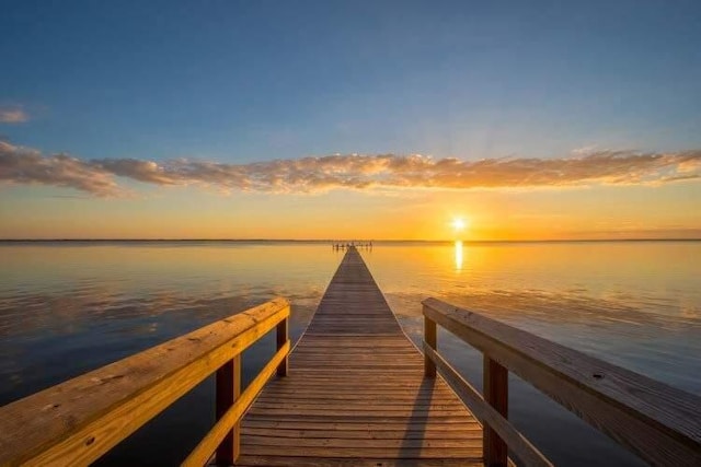 dock area with a water view