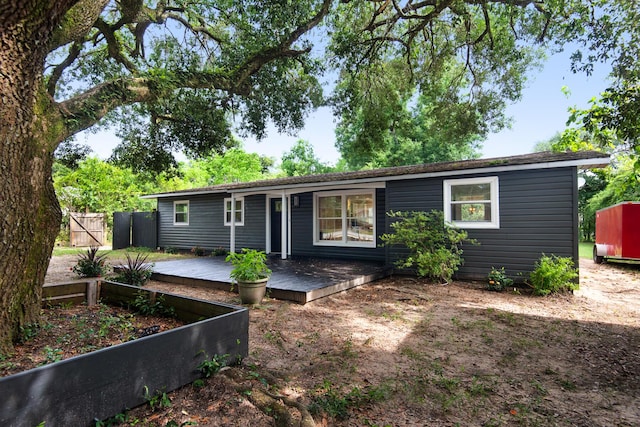 ranch-style house with a deck