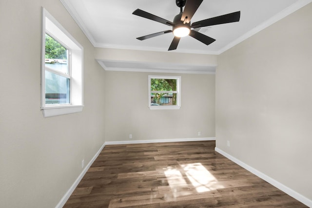 unfurnished room featuring dark hardwood / wood-style flooring, ceiling fan, and ornamental molding