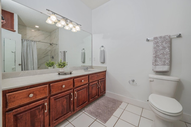 bathroom featuring toilet, tile patterned floors, vanity, and walk in shower