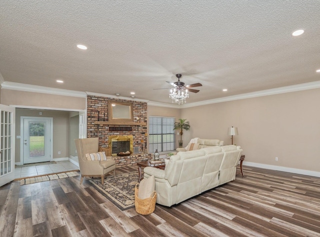 living room featuring hardwood / wood-style flooring and ornamental molding