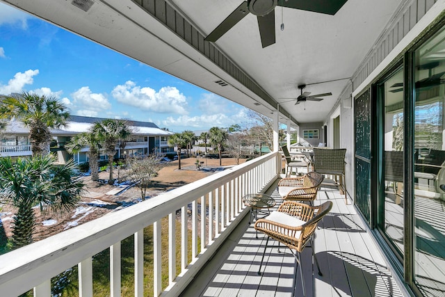 balcony featuring ceiling fan