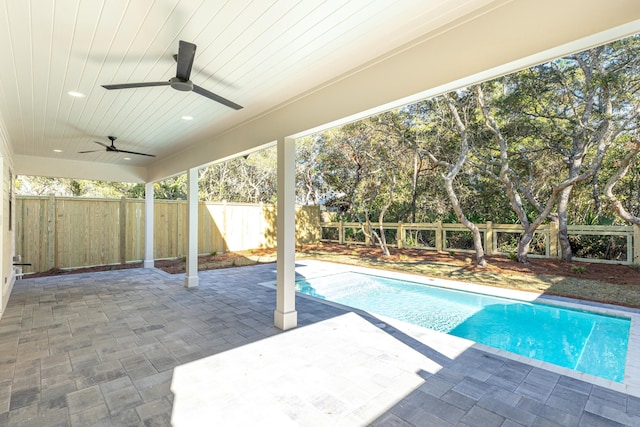 view of pool featuring a patio area and ceiling fan