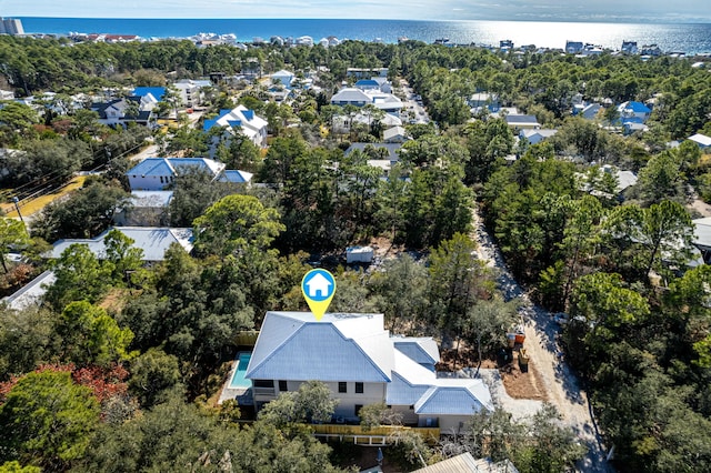 drone / aerial view with a water view