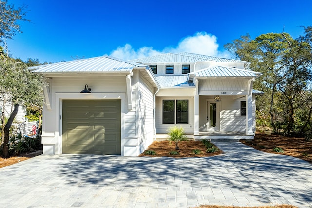 view of front of home with a garage