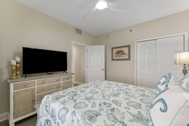 bedroom featuring ceiling fan and a closet