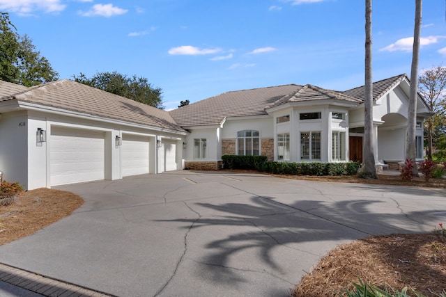 view of front of home with a garage