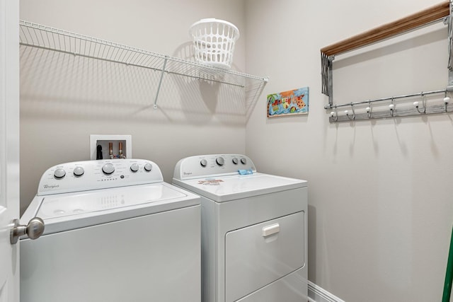 laundry room featuring independent washer and dryer