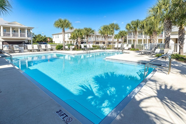 view of pool featuring a patio