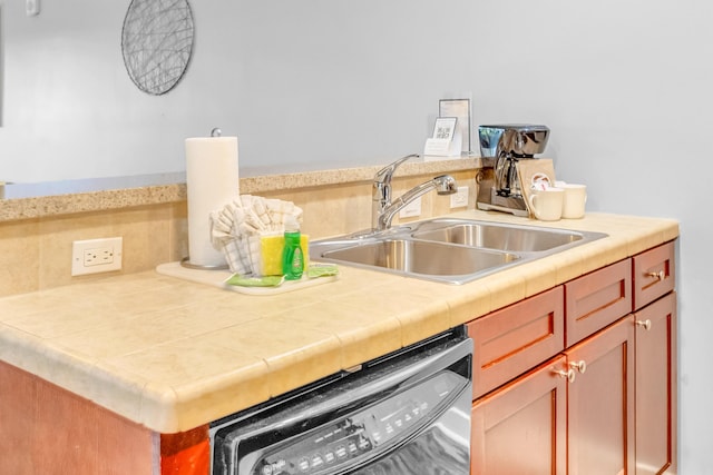 kitchen with sink and black dishwasher