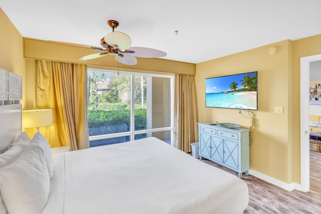 bedroom with ceiling fan and light wood-type flooring