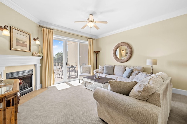 living room featuring ceiling fan and ornamental molding