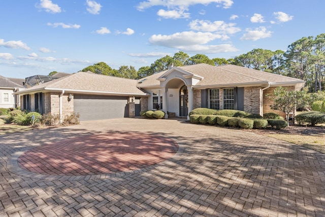 ranch-style home with a garage