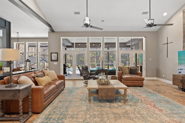 living room featuring french doors and ceiling fan