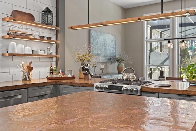 kitchen with gray cabinetry and range