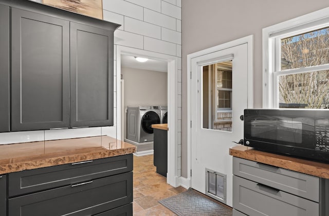 bathroom featuring separate washer and dryer