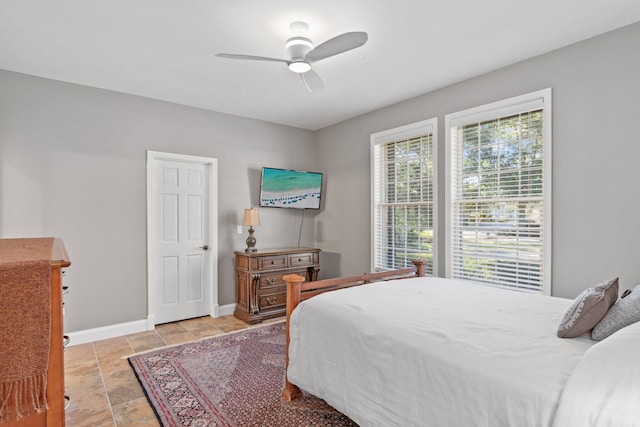 bedroom featuring ceiling fan