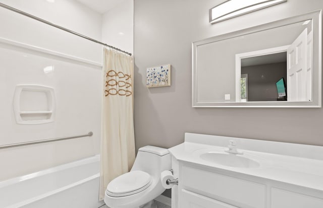 full bathroom featuring shower / bath combo, vanity, and toilet