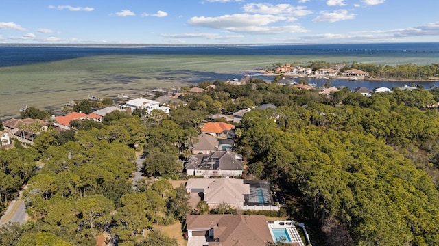 bird's eye view with a water view