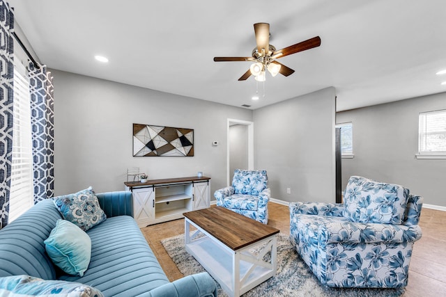 living room with ceiling fan