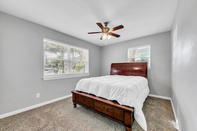 bedroom with ceiling fan and carpet flooring