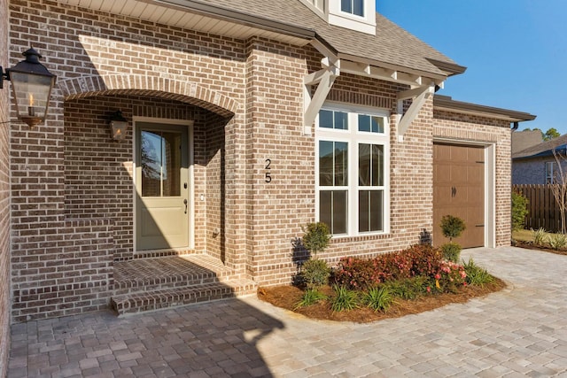 property entrance featuring a garage