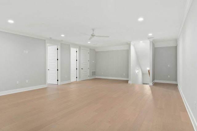 interior space with ceiling fan and light hardwood / wood-style flooring