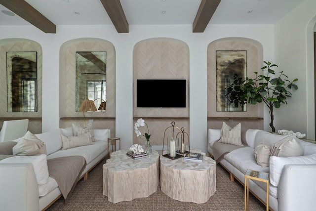 living room with beam ceiling