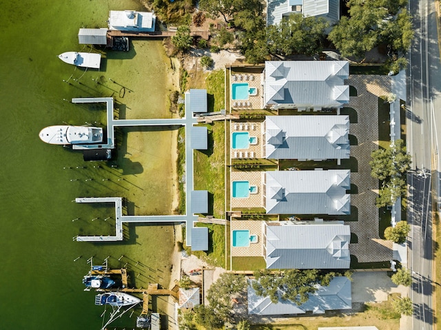 drone / aerial view with a water view