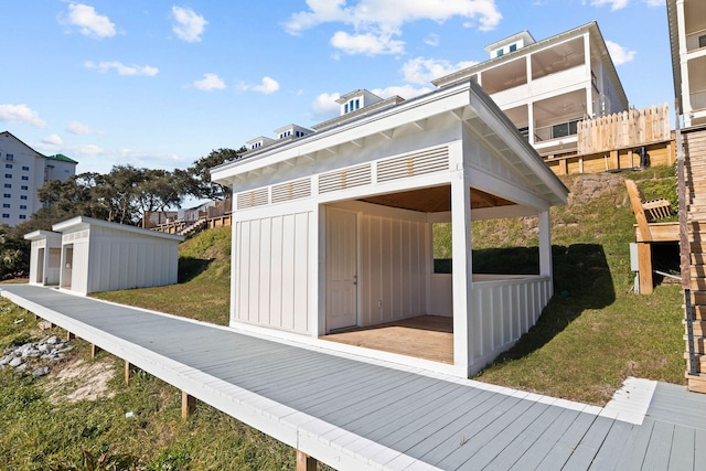 view of outbuilding featuring a yard