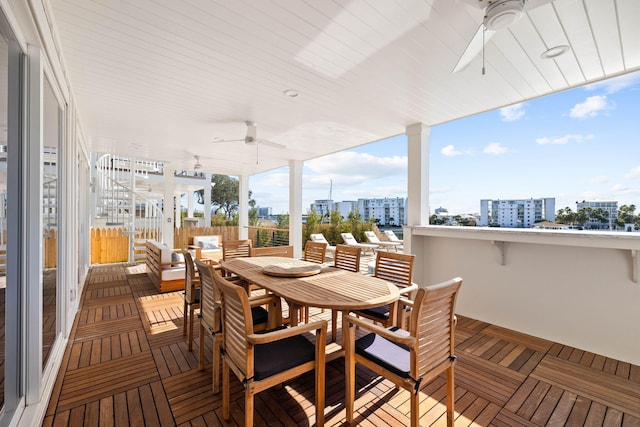 wooden deck with ceiling fan