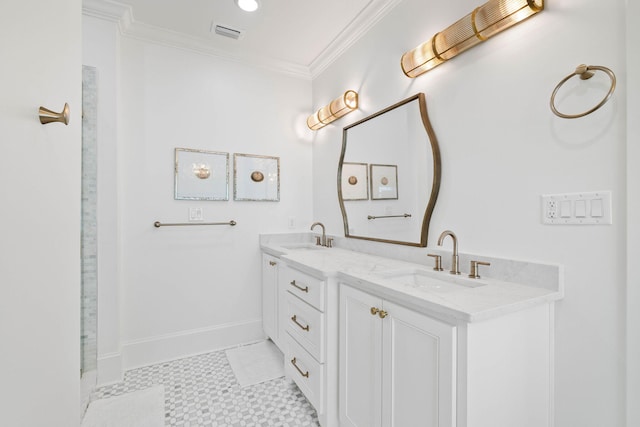 bathroom with ornamental molding, tile patterned floors, and vanity