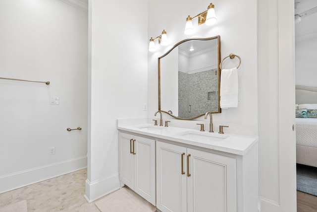 bathroom with vanity and crown molding