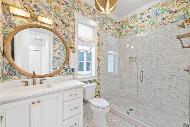 bathroom featuring toilet, walk in shower, ornamental molding, and vanity