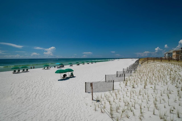 property view of water featuring a beach view