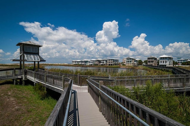 view of dock with a water view