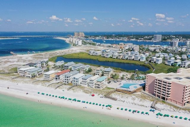 aerial view featuring a water view and a beach view