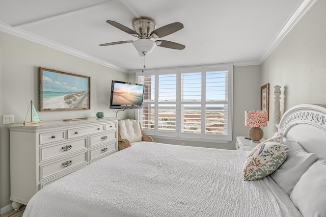 bedroom featuring ceiling fan and crown molding