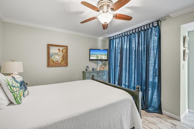 bedroom featuring ceiling fan, crown molding, and light wood-type flooring