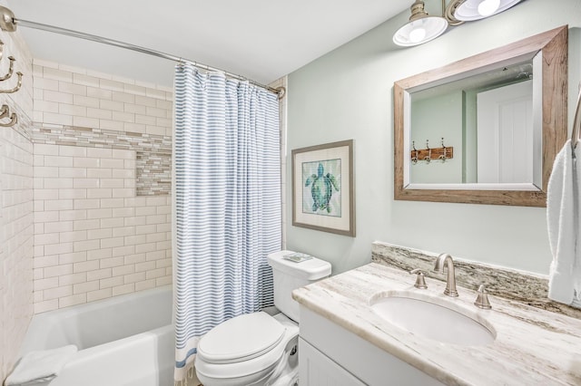 full bathroom with toilet, shower / tub combo, and vanity