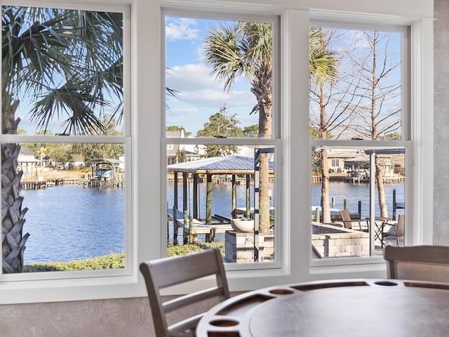 entryway featuring a healthy amount of sunlight and a water view