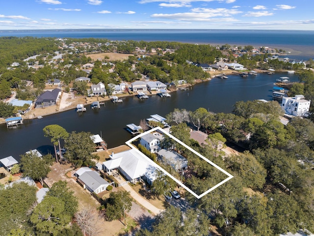 aerial view with a residential view and a water view