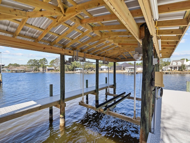 dock area featuring a water view and boat lift