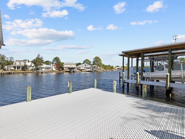 view of dock featuring a water view and boat lift