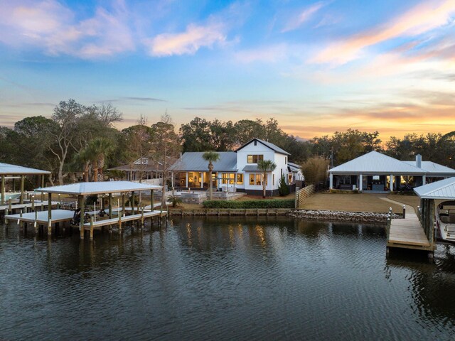 dock area featuring a water view and boat lift