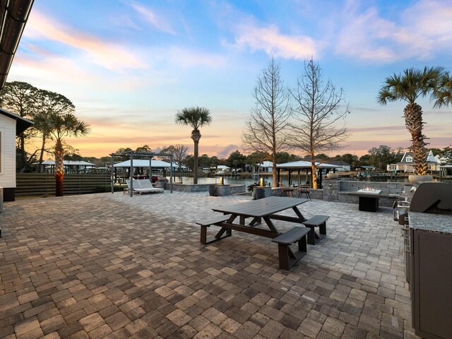 view of property's community featuring a patio and a gazebo