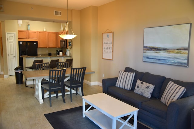 living room featuring light hardwood / wood-style floors