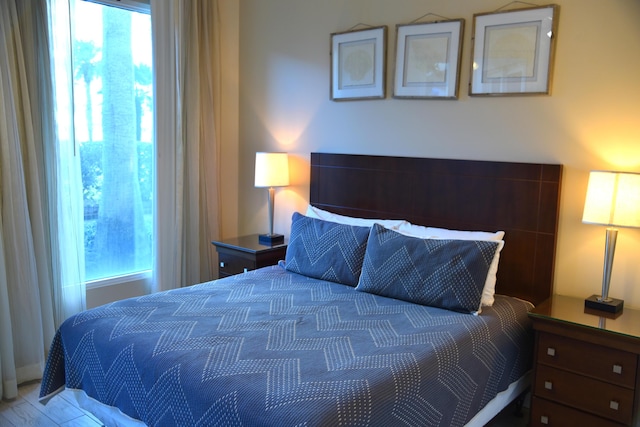 bedroom featuring hardwood / wood-style flooring