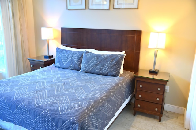 bedroom featuring light wood-type flooring